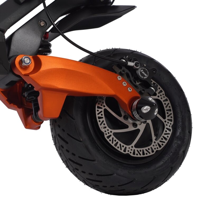 A close up view of an orange electric scooter.