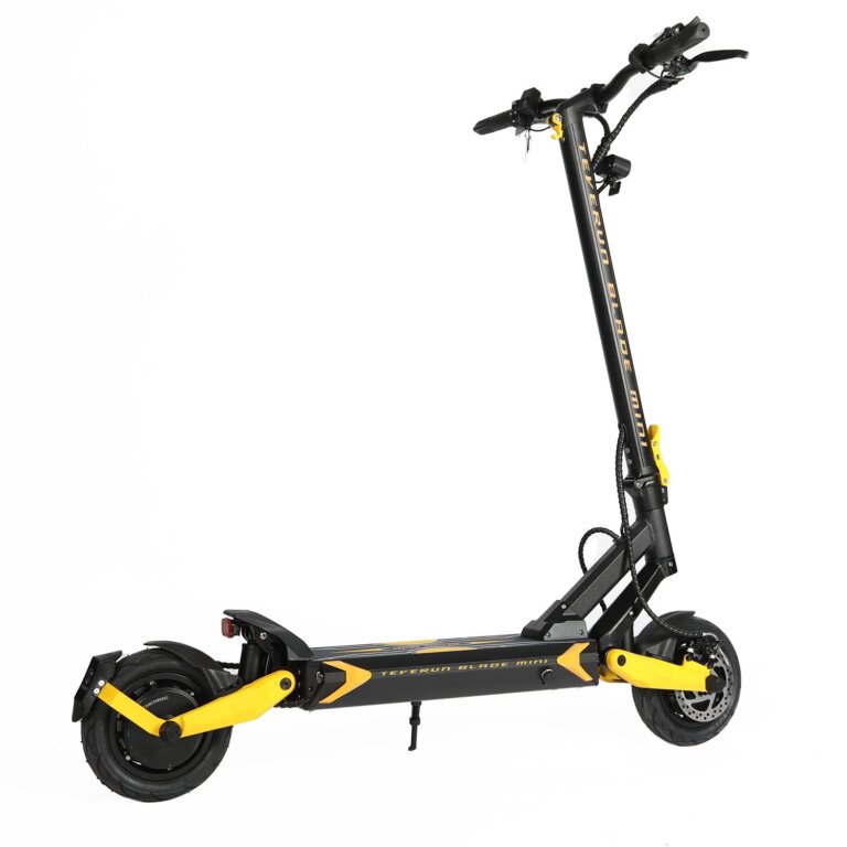 A black and yellow Blade Mini Pro electric scooter on a white background.