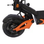 An orange Blade GT II scooter on a white background.