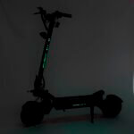 The Blade GT II electric scooter is shown in the dark.